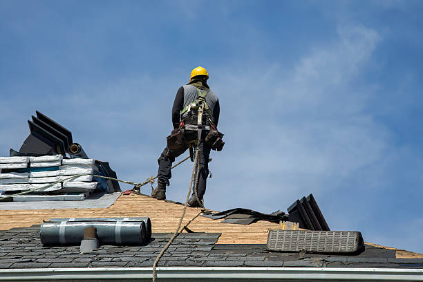 Professional Roof Replacement technician working in Kingsville, MO